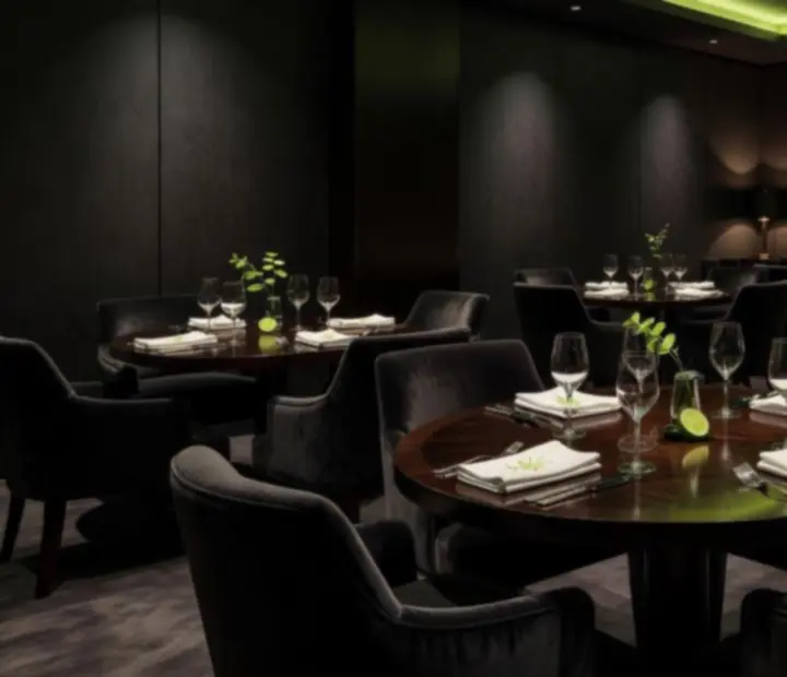 Salle de restaurant haut de gamme privatisée avec ambiance lumineuse vert acidulé